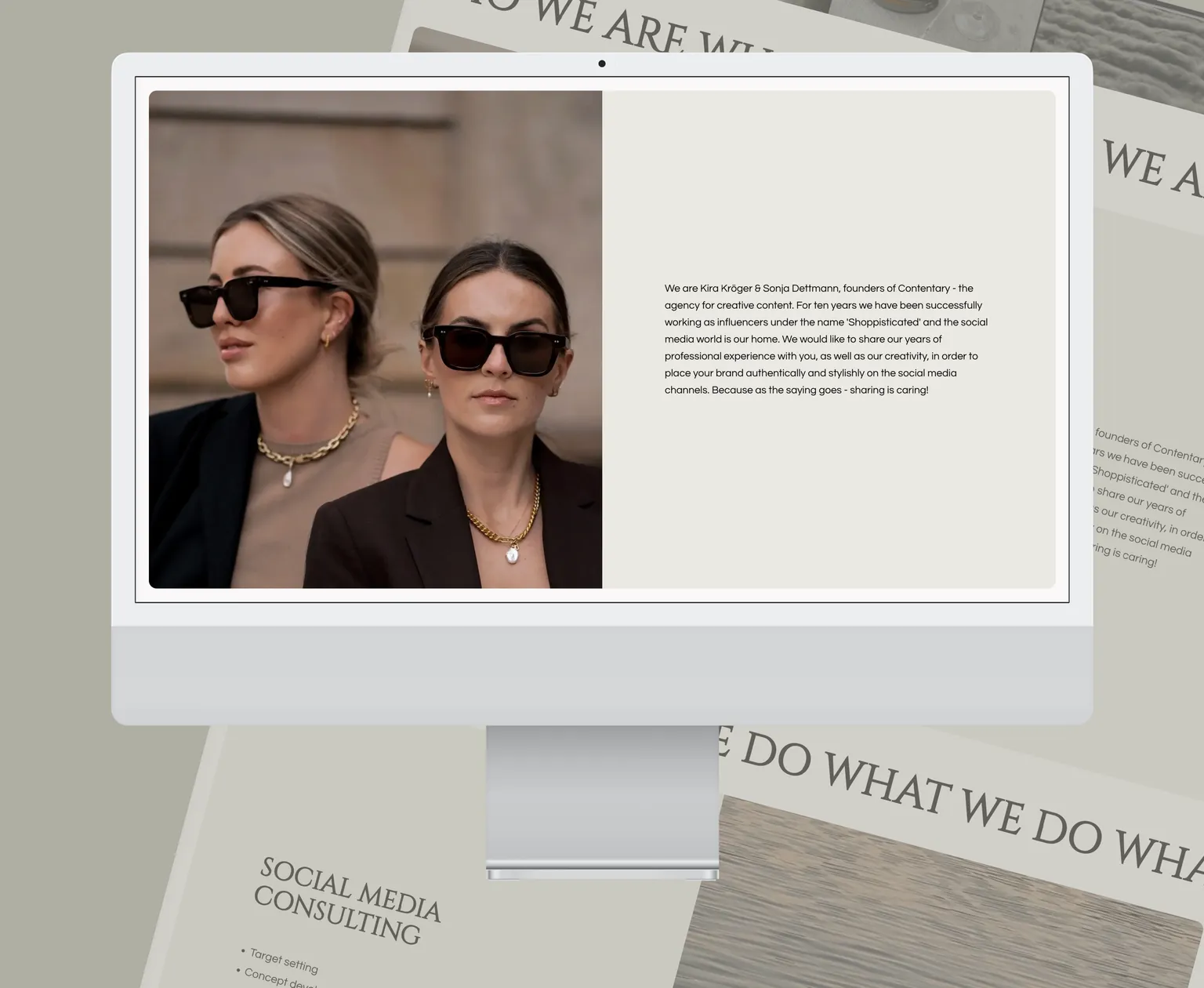 An iMac showing the who we are section of the website, with a part of the website in the background