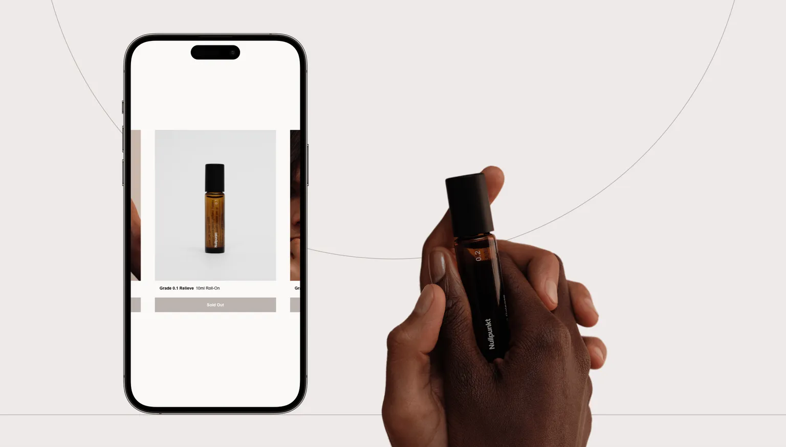 A project slider on an iPhone mockup on the left and a hand holding a Nullpunkt grade on the right